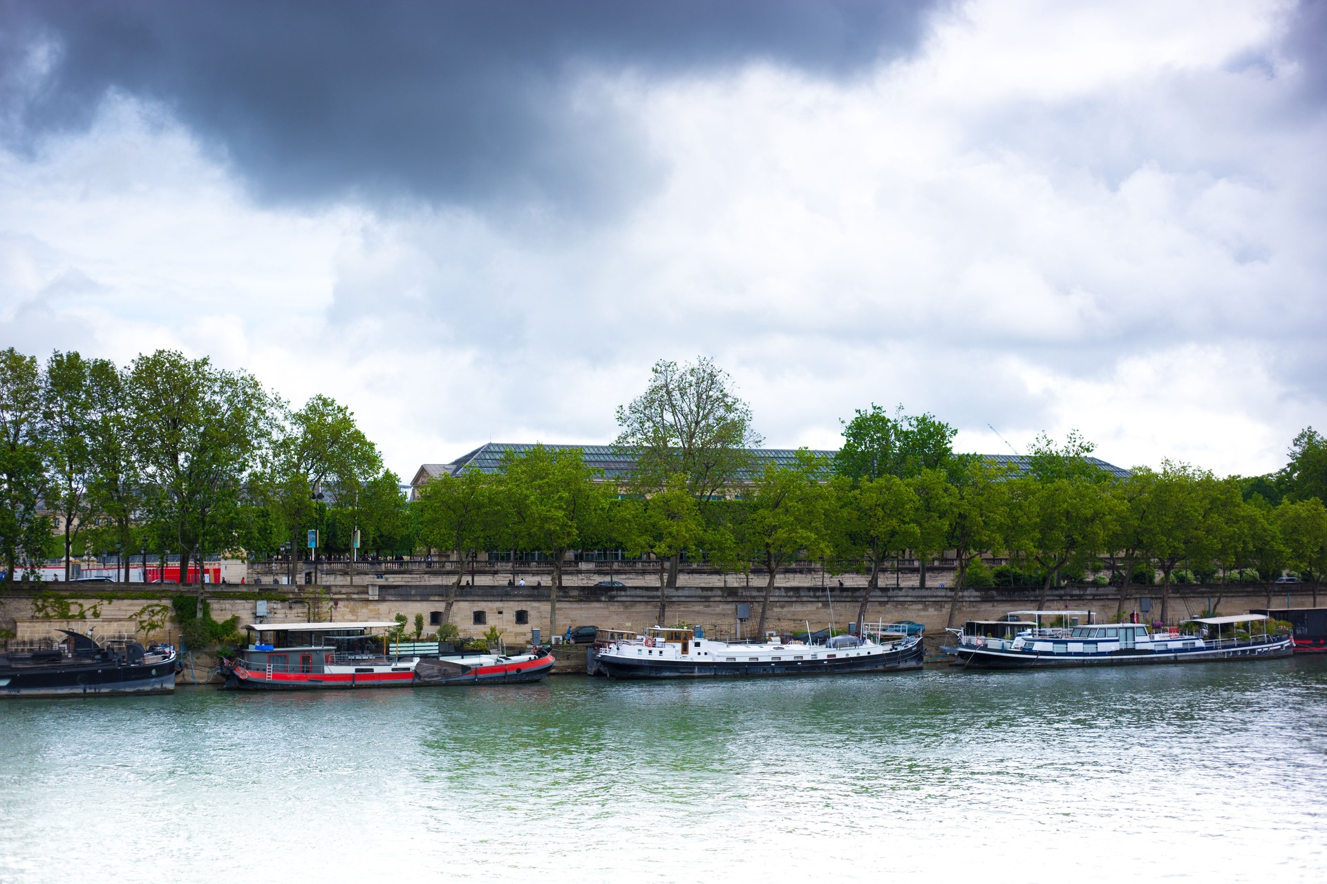 Paris, France: Houseboats on the Seine, Overcast Sky